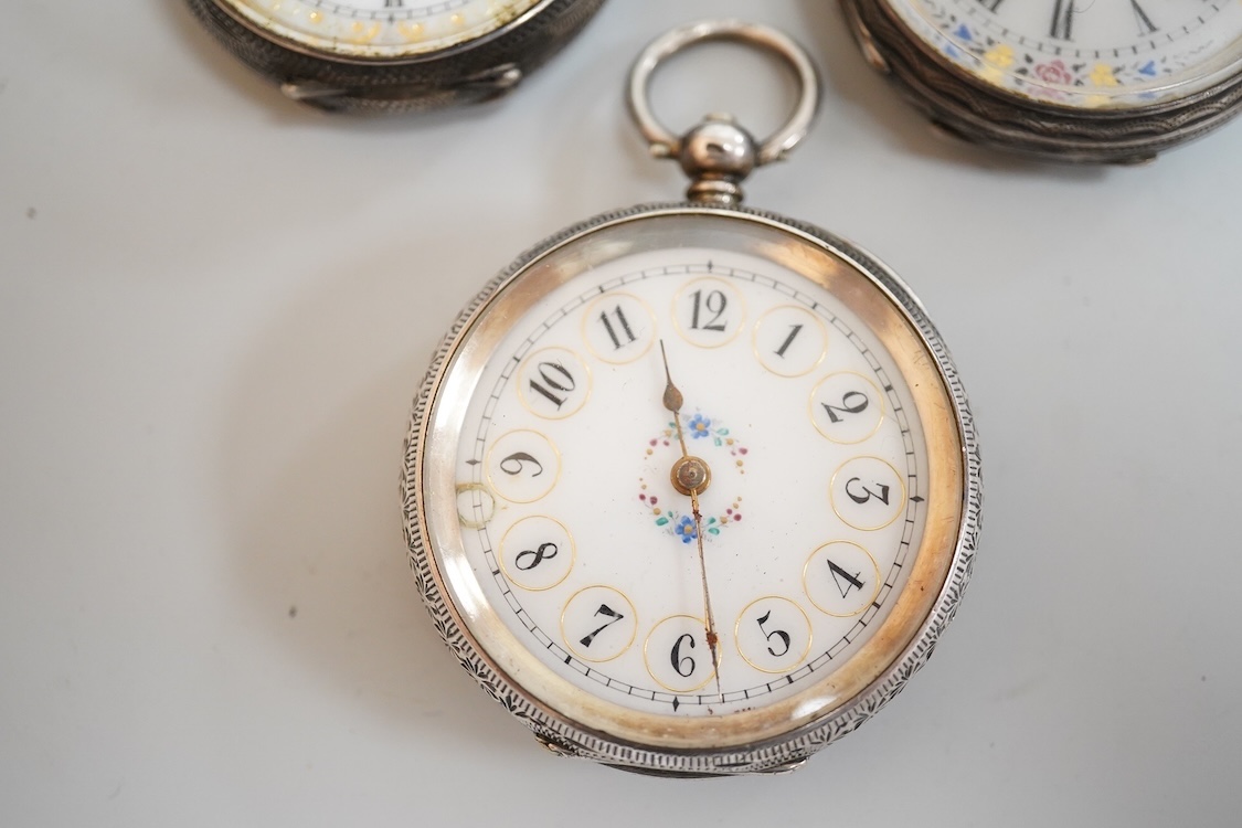 An early 20th century silver open faced pocket watch, with Arabic dial and subsidiary seconds, together with four other white metal open faced fob watches and a white metal half hunter pocket watch, case diameter 44mm.